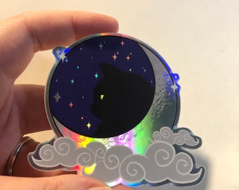 Black Cat in the Moon with Swirl Clouds Holographic Sticker | Witch Cat Moon Vinyl Sticker