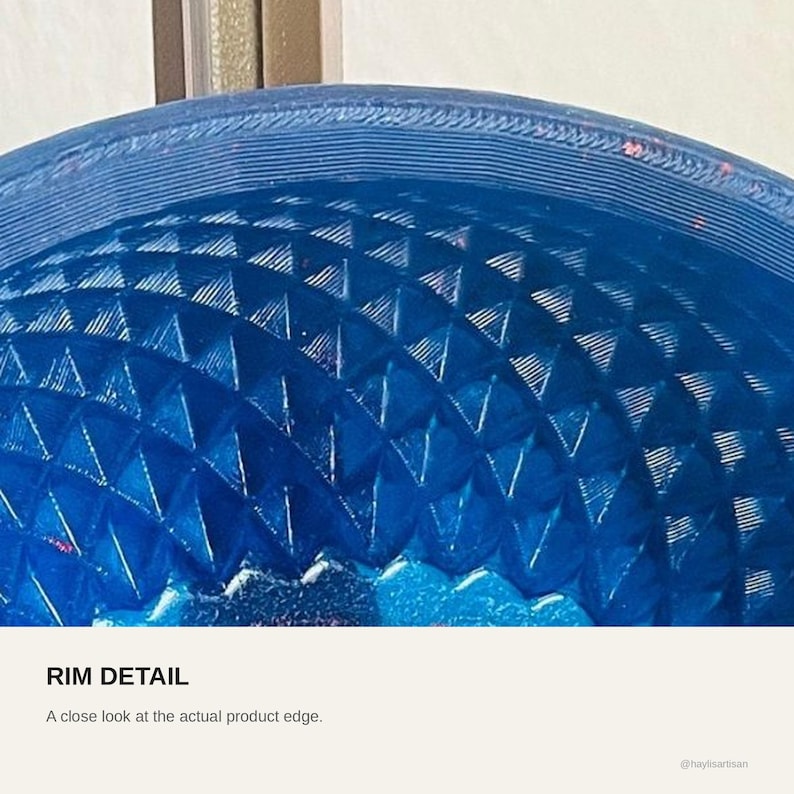 Rim detail of the royal blue shaving bowl, a close look at the actual product edge and the moulded diamond texture below it.