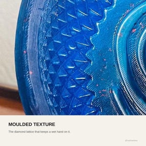 The moulded diamond lattice on the bowl wall, the texture that keeps a wet hand from losing its grip.
