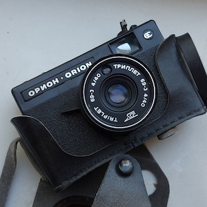 Film camera ORION with a Lens Triplet T-69-3 4/40 in a case of the USSR