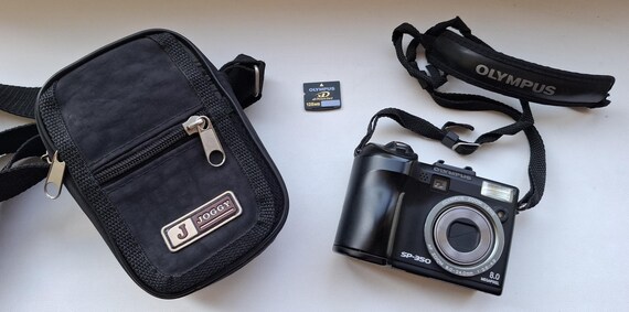 Olympus SP-350 is 8-megapixel Compact Digital Camera + 128MB Xd