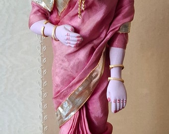 Collectible Hindu doll in brightly colored national ethnic dress