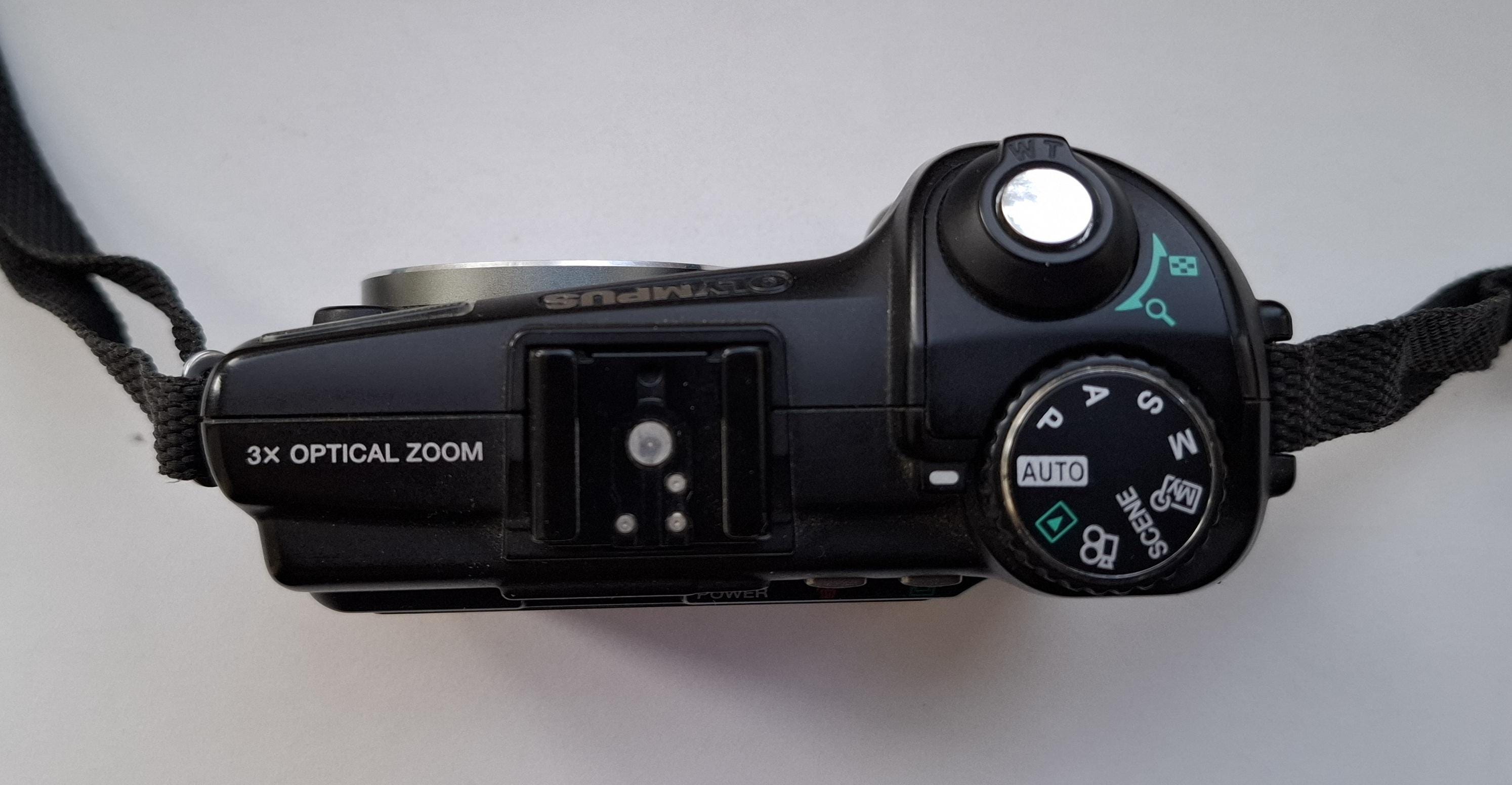 Olympus SP-350 is 8-megapixel Compact Digital Camera + 128MB Xd