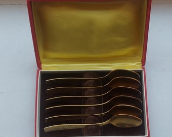 Excellent rare Stainless steel set of the USSR of 6 vintage gold color tea spoons in original box