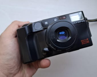 Vintage Y2K Olympus AZ-200 Super Zoom film compact camera (also known as the Infinity Zoom 200) is equipped with a 38–80mm zoom lens