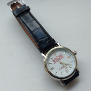 Excellent rare quartz wristwatch