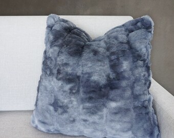 blue fluffy cushions