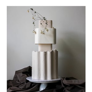 Originele gegolfde cakevormer acryl cakegids botercrème ganacheplaten - cakegids - caketool
