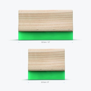 May include: Two screen printing squeegees. Each squeegee has a wooden handle and a bright green rubber blade. The larger squeegee is 30.5cm wide, and the smaller one is 20.5cm wide. These tools are used for applying ink to screens in the screen printing process.