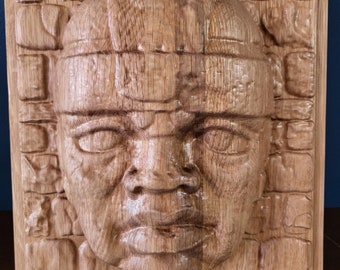 Olmec white oak wood carving