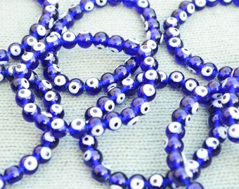 Pulsera artesanal del ojo turco: cuentas turcas azules, joyería de protección.