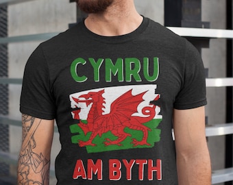 May include: A black t-shirt with a green and red Welsh dragon and the text "CYMRU AM BYTH" in green and red.