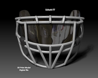 Può includere: Maschera per il viso da football bianca con visiera trasparente. La maschera è etichettata "Schutt F7". Modello di stampa 3D File digitale.