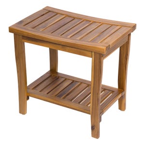 May include: A wooden shower bench with a slatted seat and lower shelf. The bench is made of light brown wood and has a curved seat for comfort. The legs are sturdy and slightly curved.