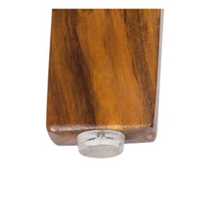 May include: Close-up of a wooden furniture leg with a clear, round foot. The wood grain is visible, showing a mix of light and dark brown tones. The foot is made of a clear, possibly plastic, material.