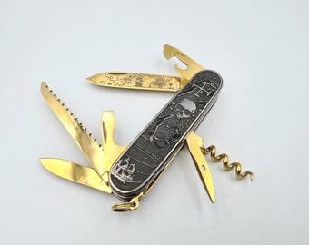 23.8c (999 finegold) goldplated Swiss army knife laserengraved,pirate customized 91 mm model,custom sak engraved,black nickel plated scales