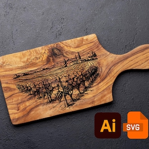 May include: Wooden cutting board with a handle, featuring a detailed engraved vineyard scene. The board is made of light brown wood with a natural grain pattern. The design includes a farmhouse, rows of grapevines, and a landscape. Includes Ai and SVG file icons.