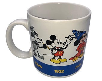 Taza de cerámica vintage de Disney Mickey Mouse de los años 90 "A través de los años" Aplausos 33417