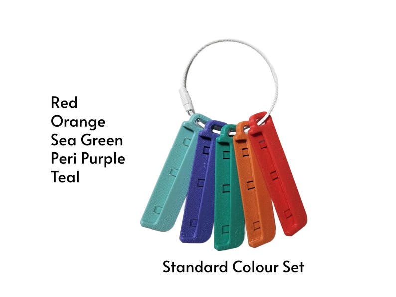 May include: A set of five rectangular plastic tags in red, orange, sea green, peri purple, and teal, held together by a white circular cable. The text reads: Red, Orange, Sea Green, Peri Purple, Teal, Standard Colour Set.