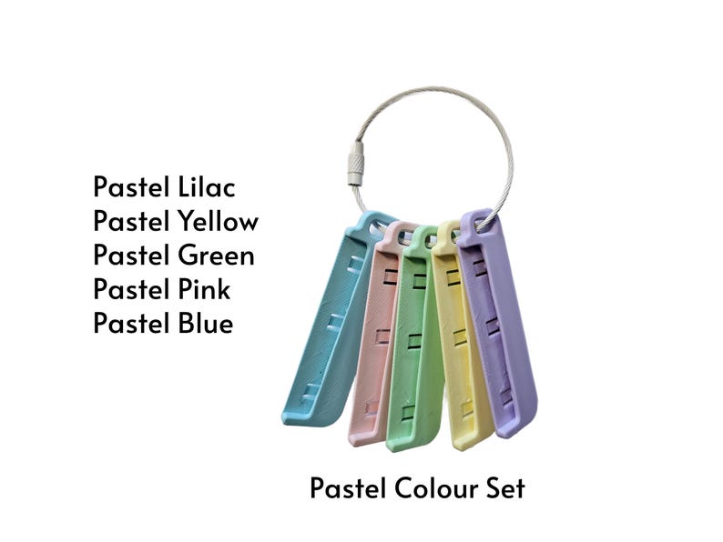 May include: A set of five rectangular plastic tools in pastel lilac, yellow, green, pink, and blue, held together by a silver metal ring. The text reads: Pastel Lilac, Pastel Yellow, Pastel Green, Pastel Pink, Pastel Blue, Pastel Colour Set.