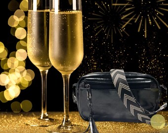 Beautiful black patent  vegan leather crossbody bag. Very dressy.  Evening bag.