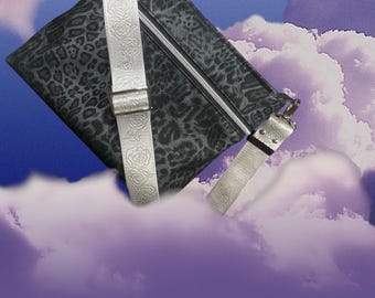Animal print crossbody bag. Black faux leather
