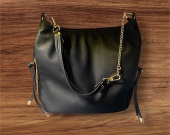 Slouchy large bag.  Black vegan leather, Gold hardware. Ora Rosa Pattern