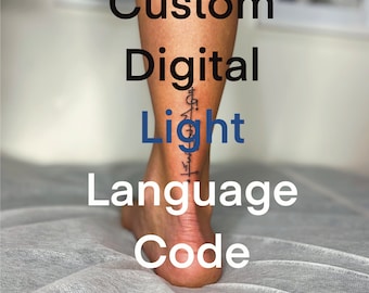 May include: A vertical black ink tattoo on the lower leg featuring a series of interconnected geometric lines, circles, and symbols. The text Custom Digital Light Language Code is overlaid in large black and white lettering across the image.