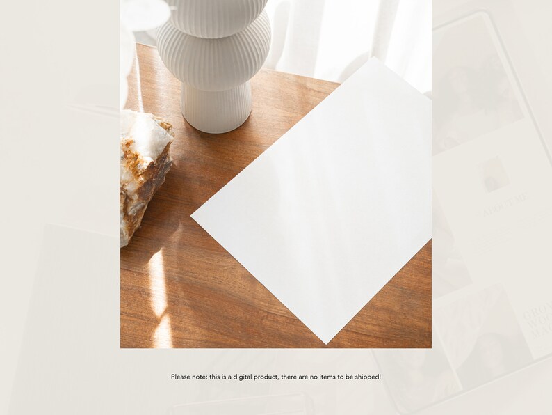 May include: A white ceramic vase with a textured design sits on a wooden table with a white sheet of paper on top. The paper is blank and the table is illuminated by sunlight.