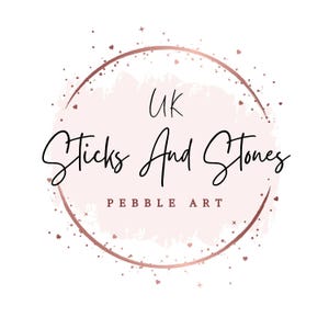 May include: A logo for "UK Sticks And Stones Pebble Art" features a pink watercolor-style circle with a rose gold outline and accents. The text is in a handwritten style, with "UK" at the top and "Pebble Art" at the bottom.