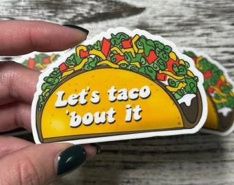 May include: A yellow taco with green lettuce, red and yellow toppings, and the text "Let's taco 'bout it".