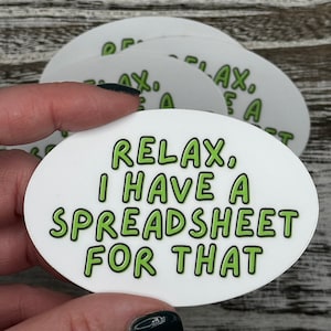 May include: White oval sticker with green text that reads "Relax, I have a spreadsheet for that."