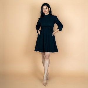 black turtleneck fit and flare dress Petal and Pup Women's Sunni Turtleneck Midi Dress