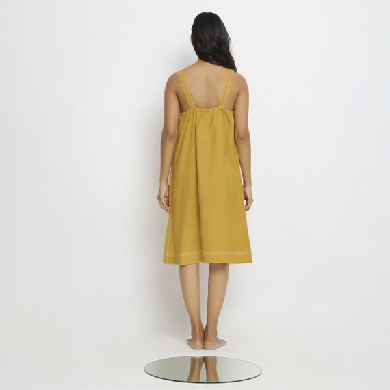 Strappy knee top length dress