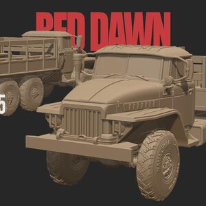 May include: A tan-colored Ural 375 military truck model with a cargo bed and large tires. The text "RED DAWN" is displayed in red at the top of the image. The text "URAL 375" is displayed in white on the left side of the image.