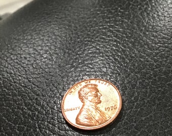 Lincoln Penny 1976 No mint mark. In gutem Zustand.