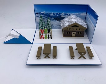 Explosion box as a voucher for a ski holiday, snowboard holiday, hiking holiday or as an original packaging for holiday money
