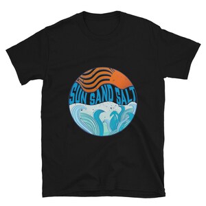 May include: Black t-shirt with a graphic of a sun setting over waves and the text "Sun Sand Salt".
