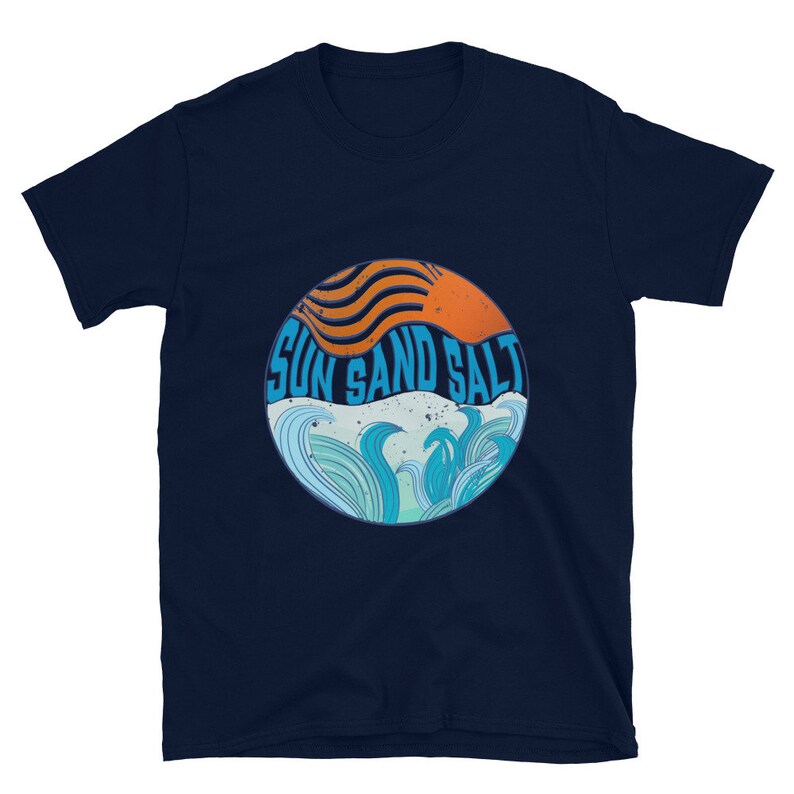 May include: Navy blue t-shirt with a graphic of a sun setting over waves and the text "Sun Sand Salt".