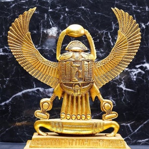 Egyptian Winged scarab, Winged scarab beetle figurine. scarab with sun disk, Egyptian scarab, made in Egypt