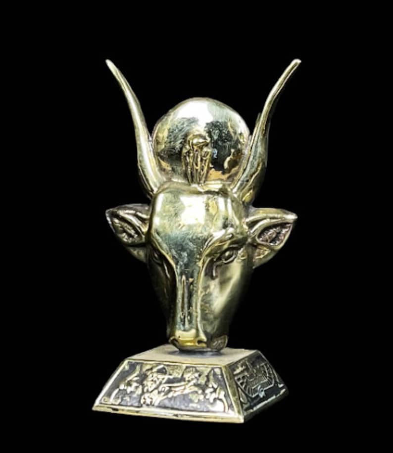 Fantastic Hathor Goddess as a cow face with cow ears and wearing sun disk hathor statuette made with Egyptian soul. image 1