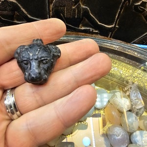 Sekhmet goddess head as an Granite amulet - handmade accessories - Made in Egypt .