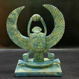 Gorgeous Blue Scarab beetle ( Symbol of Good luck ) standing on a Boat like the original one - Altar statue made from Blue stone in Egypt