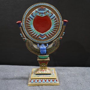 Double-Faced Scarab Mirror : Symbol of Transformation and Reflection