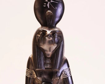 Beautiful RA the god of sun with falcon face and wearing Sun disc with the Cobra - made in Egypt.