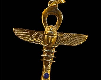 Ankh key, Key of life pendant, spread wings scarab with the Djed stand, studded with lapis lazuli٫