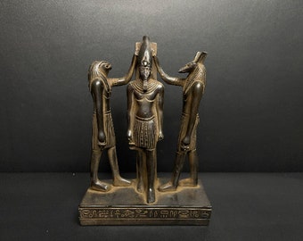 In A perfect scene King Ramesses the Third, the god Horus and the god Seth performing the Coronation of Ramesses the Third - made in Egypt