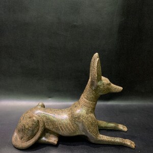 Anubis Jackal God of Afterlife & Mummification Seated To Protect The Dead Doctor Anubis jackal dog . image 6