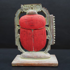 The Dual Nature of the Double-Faced Scarab: Symbol of Rebirth and Protection