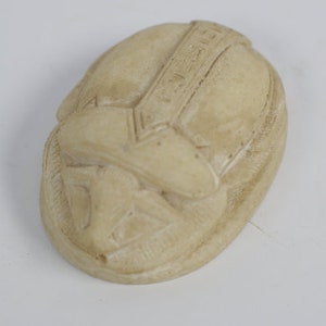 The Good luck SCARAB symbol of Good luck with The Egyptian hieroglyphs made from lime stone our item is made with Egyptian soul image 2